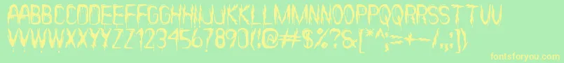 ItВґsScaryNowSt Font – Yellow Fonts on Green Background