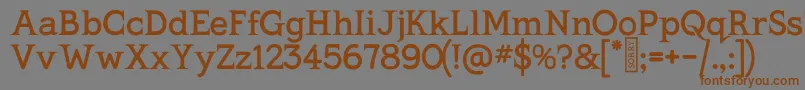 フォントKingthingsSerifique – 茶色の文字が灰色の背景にあります。