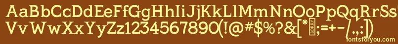 KingthingsSerifique-fontti – keltaiset fontit ruskealla taustalla