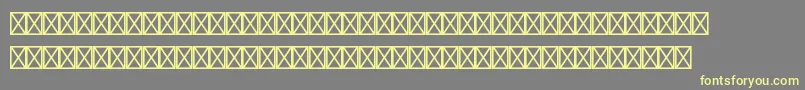 フォントEuromonostdItalic – 黄色のフォント、灰色の背景