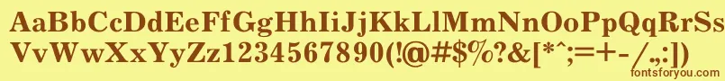 フォントJournalBold – 茶色の文字が黄色の背景にあります。