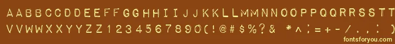 ImpactLabelReversed-fontti – keltaiset fontit ruskealla taustalla