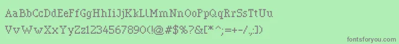 Pixerif-fontti – harmaat kirjasimet vihreällä taustalla