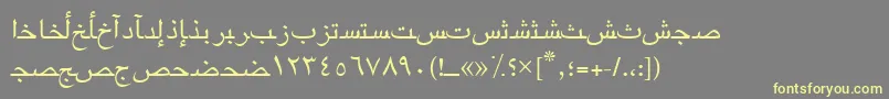 Шрифт Arabicriyadhssk – жёлтые шрифты на сером фоне