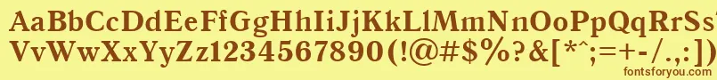 Qna65C Font – Brown Fonts on Yellow Background