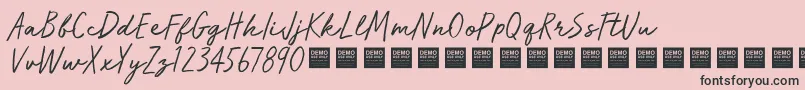 Więcej informacji o czcionce RunWildDemo Czcionka RunWildDemo – czarne czcionki na różowym tle