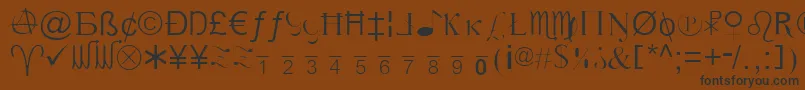 フォントXCryptionLight – 黒い文字が茶色の背景にあります