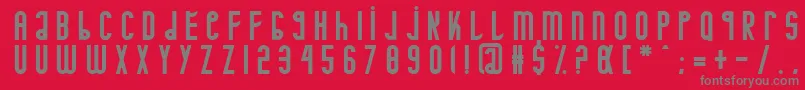 Minotaure-Schriftart – Graue Schriften auf rotem Hintergrund