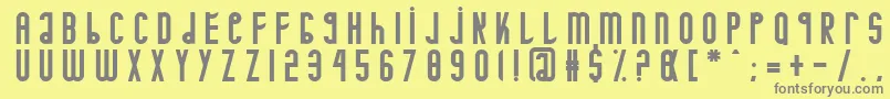 Minotaure Font – Gray Fonts on Yellow Background
