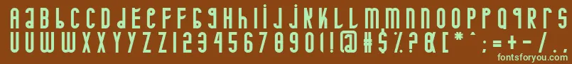 フォントMinotaure – 緑色の文字が茶色の背景にあります。