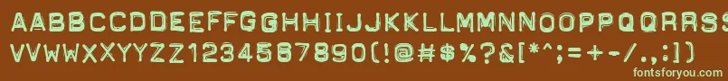 フォントPftapeomaticHighPressure – 緑色の文字が茶色の背景にあります。