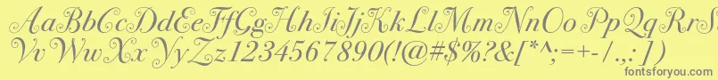 Czcionka Bodoni72swashc – szare czcionki na żółtym tle
