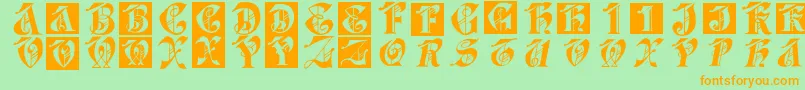 Dolbyfraxcaps Font – Orange Fonts on Green Background