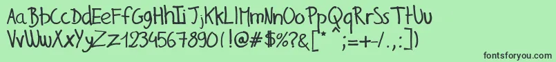 GillesHandwriting Font – Black Fonts on Green Background