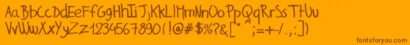 GillesHandwriting Font – Brown Fonts on Orange Background