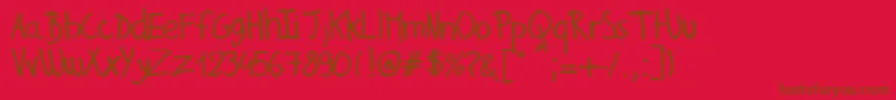 GillesHandwriting Font – Brown Fonts on Red Background