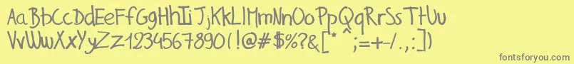 GillesHandwriting Font – Gray Fonts on Yellow Background