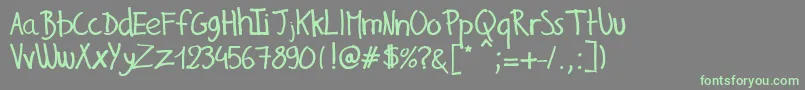 GillesHandwriting Font – Green Fonts on Gray Background