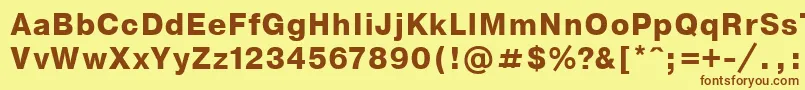 フォントNthvb – 茶色の文字が黄色の背景にあります。