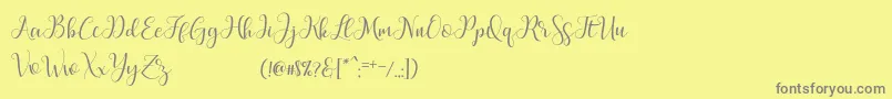 フォントMarchyScriptDemo – 黄色の背景に灰色の文字