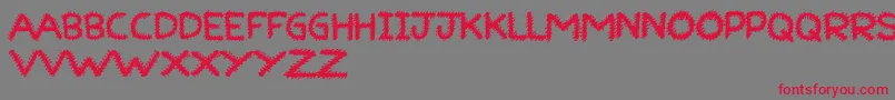 RuffRuff-Schriftart – Rote Schriften auf grauem Hintergrund
