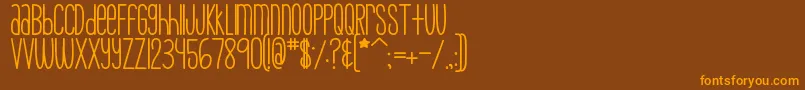 MtfSkinnyJeans-Schriftart – Orangefarbene Schriften auf braunem Hintergrund