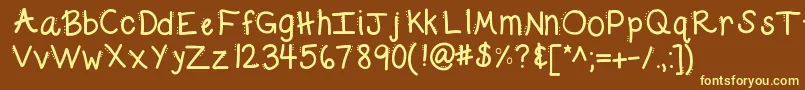 Kbdabble Font – Yellow Fonts on Brown Background