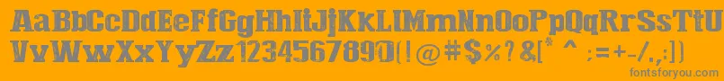 PressStyleLarge-fontti – harmaat kirjasimet oranssilla taustalla