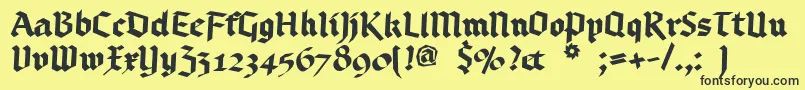 Bruchschrift-Schriftart – Schwarze Schriften auf gelbem Hintergrund