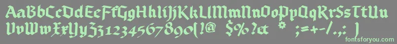 Bruchschrift-Schriftart – Grüne Schriften auf grauem Hintergrund