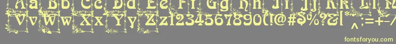 ArnoldBocklincInitials Font – Yellow Fonts on Gray Background