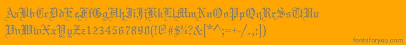 TannenbaumNormal-Schriftart – Graue Schriften auf orangefarbenem Hintergrund