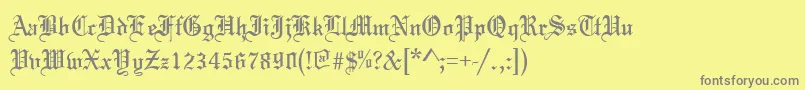 TannenbaumNormal-Schriftart – Graue Schriften auf gelbem Hintergrund