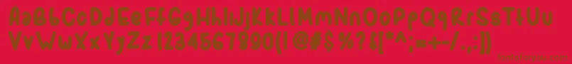 フォントSporkbold – 赤い背景に茶色の文字