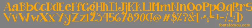 フォントJandacurlygirlchunky – オレンジの文字は灰色の背景にあります。