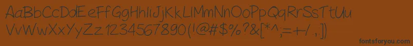 Czcionka PeaxHandwritinglight – czarne czcionki na brązowym tle