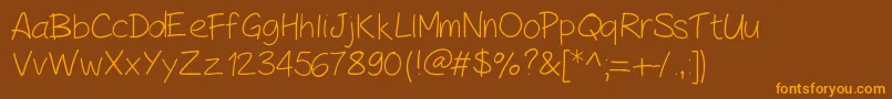 Fonte PeaxHandwritinglight – fontes laranjas em um fundo marrom
