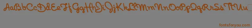IndianHotel Font – Brown Fonts on Gray Background