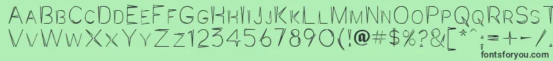 Jaggpnt Font – Black Fonts on Green Background