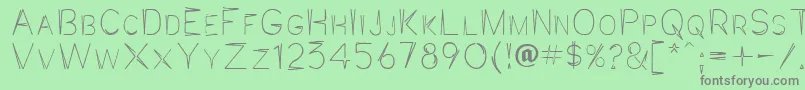 Jaggpnt Font – Gray Fonts on Green Background