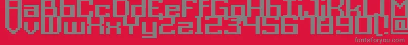 Police Acme9RegularBold – polices grises sur fond rouge
