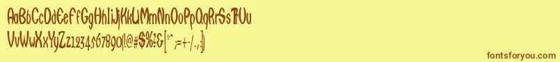 Qarats Font – Brown Fonts on Yellow Background