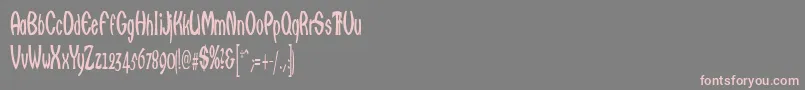 Qarats Font – Pink Fonts on Gray Background