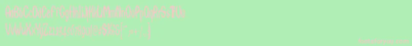 フォントQarats – 緑の背景にピンクのフォント