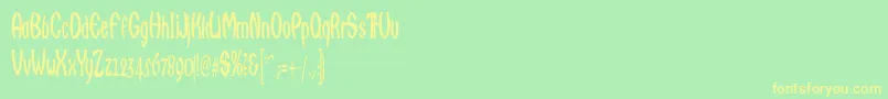 Qarats Font – Yellow Fonts on Green Background