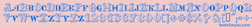 フォントMavericksLuckySpades – ピンクの背景に青い文字