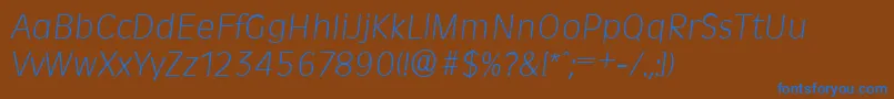 Шрифт RavennaserialXlightItalic – синие шрифты на коричневом фоне