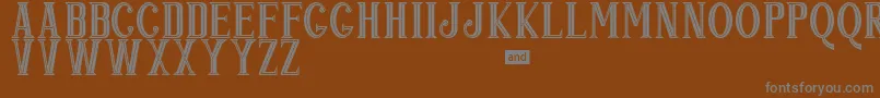 Popjazz-fontti – harmaat kirjasimet ruskealla taustalla