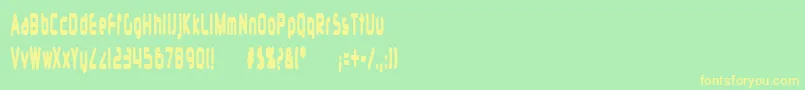 フォントSiliconCarne – 黄色の文字が緑の背景にあります