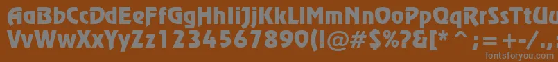 RevueTl-Schriftart – Graue Schriften auf braunem Hintergrund